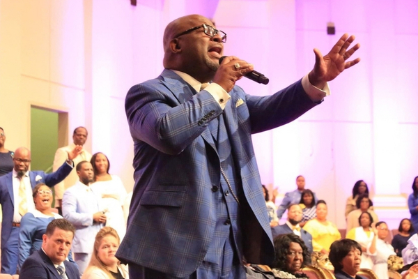 Tony Wade sings at Full Gospel Holy Temple.