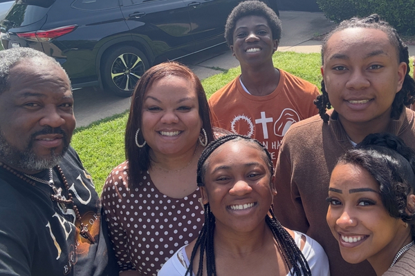 Breast cancer survivor Ashley Hardyway with her family